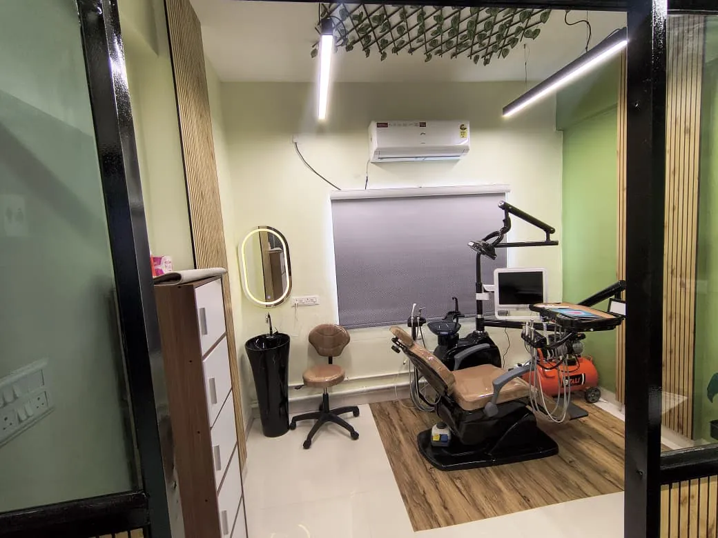 Treatment room with timber-slat wall and grey blind